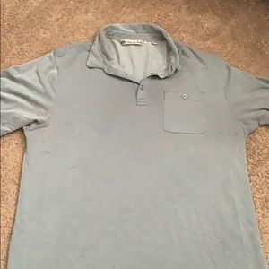 Gray Travis Mathew polo with front pocket